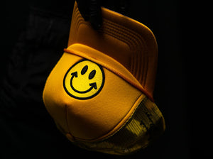 UPSIDE Originals - Yellow Smiley Trucker